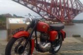 BSA C15 1963 red with boxes of spares for sale